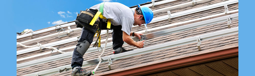 Rooftop Worker Using Active Fall Protection